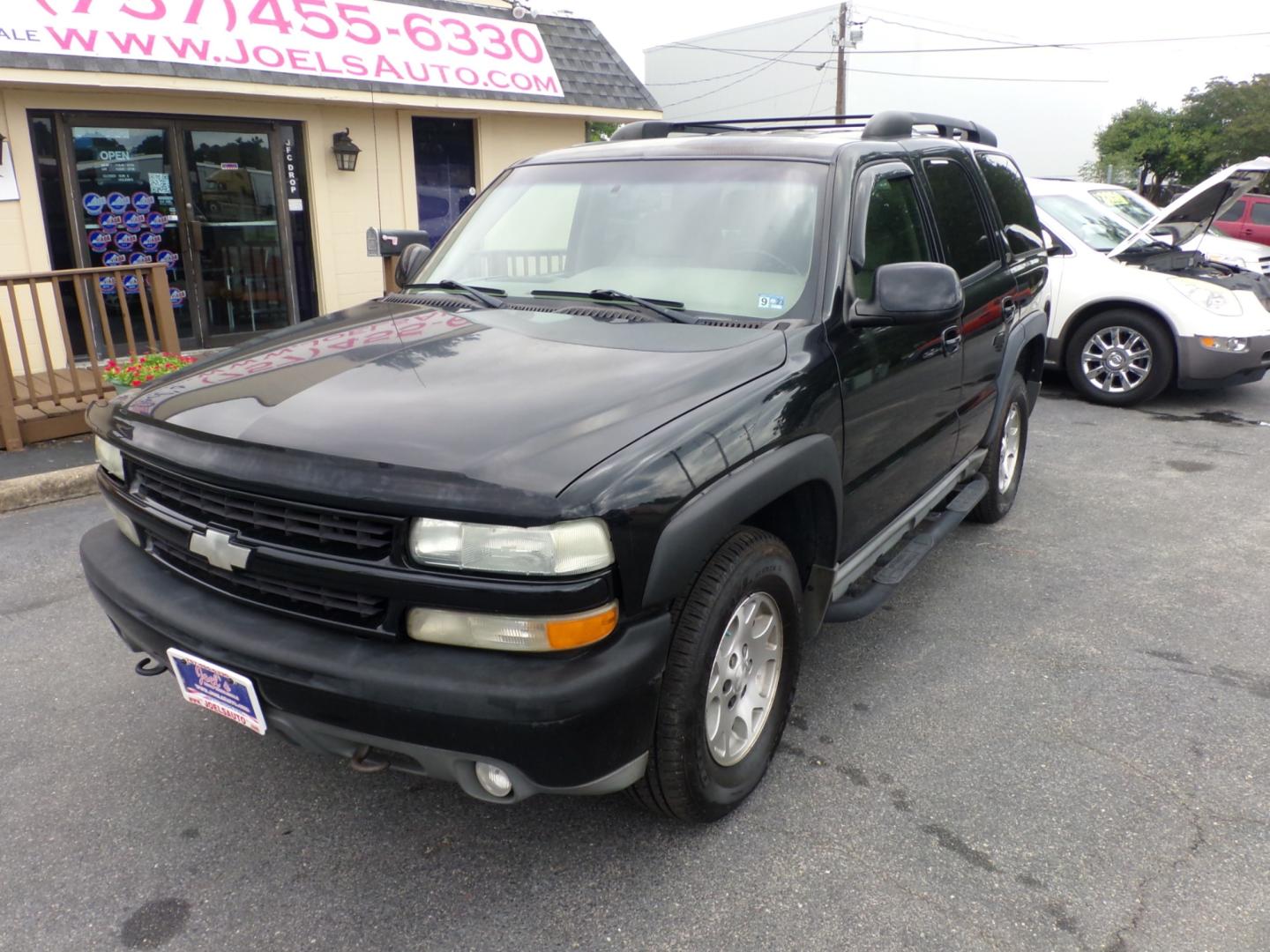 2003 Black Chevrolet Tahoe 4WD (1GNEK13Z63R) with an 5.3L V8 OHV 16V FFV engine, 4-Speed Automatic Overdrive transmission, located at 5700 Curlew Drive, Norfolk, VA, 23502, (757) 455-6330, 36.841885, -76.209412 - Photo#5